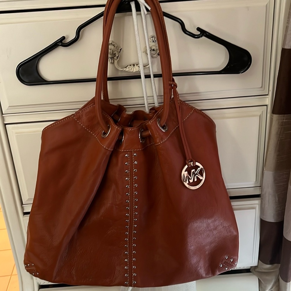 Gorgeous leather, Michael Kors, burnt orange studded tote like new